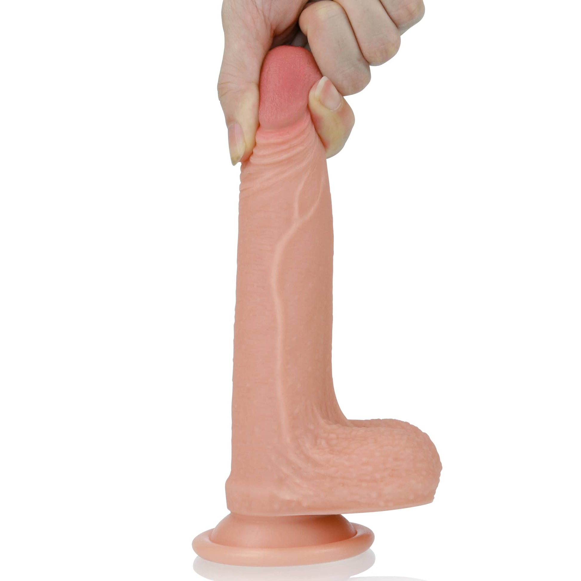 The 7 inches dual layered silicone flesh dildo is firmly attached to the floor with its suction cup