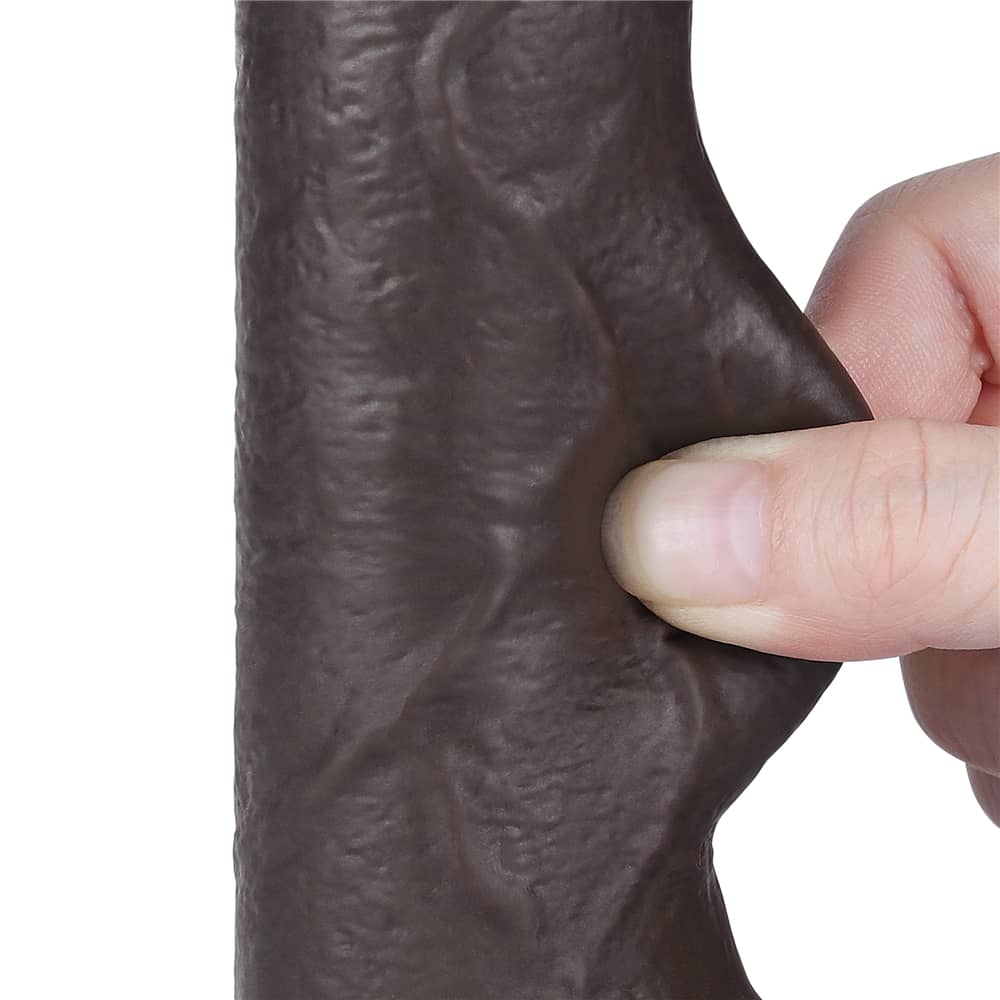 A person pinches the sliding skin of the 7 inches sliding skin dual layer black dong 