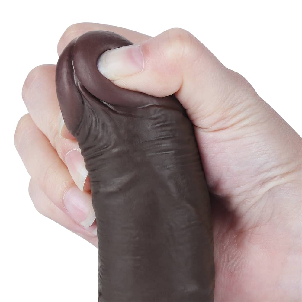 The bulging but soft head of the 7.5 inches sliding skin dual layer dong black