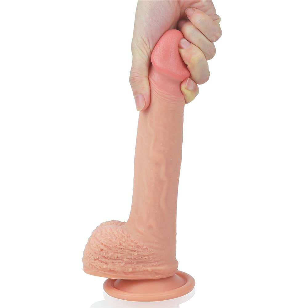 The 8.5 inches dual layered silicone flesh dildo is firmly attached to the floor with its suction cup