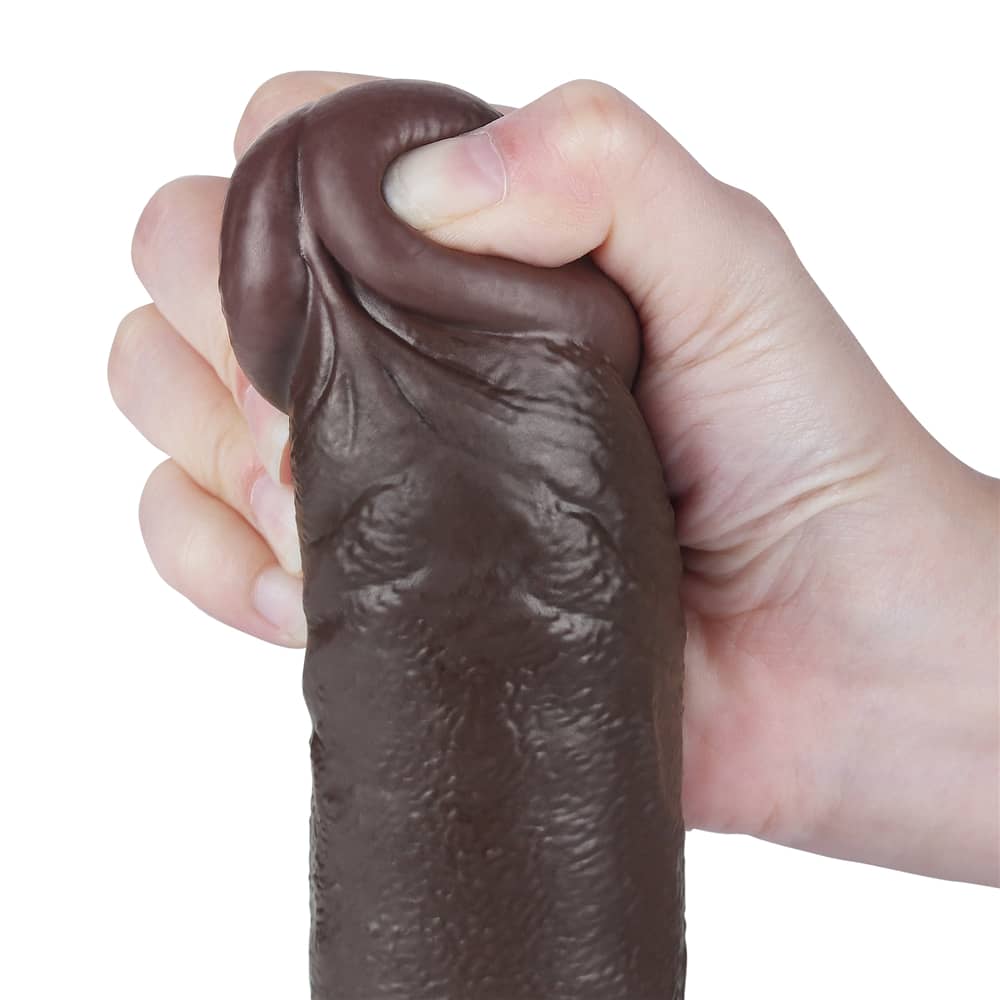 The bulging but soft head of the 9.5 inches sliding skin dong black
