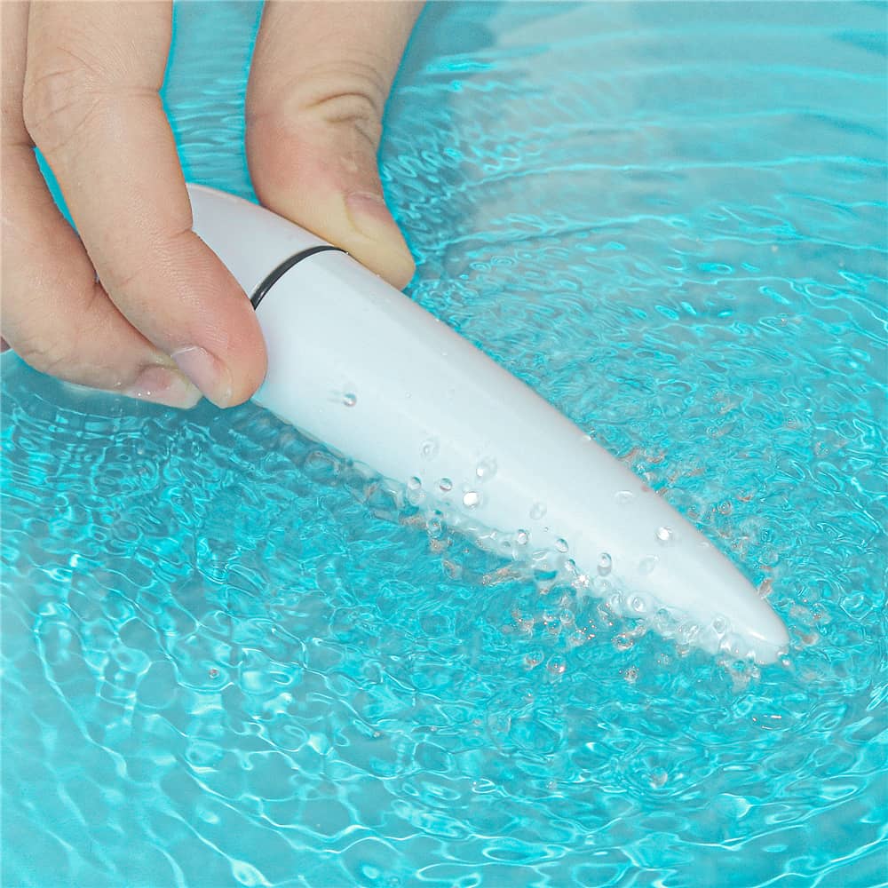 The rechargeable wireless bullet vibrator is vibrating in the water