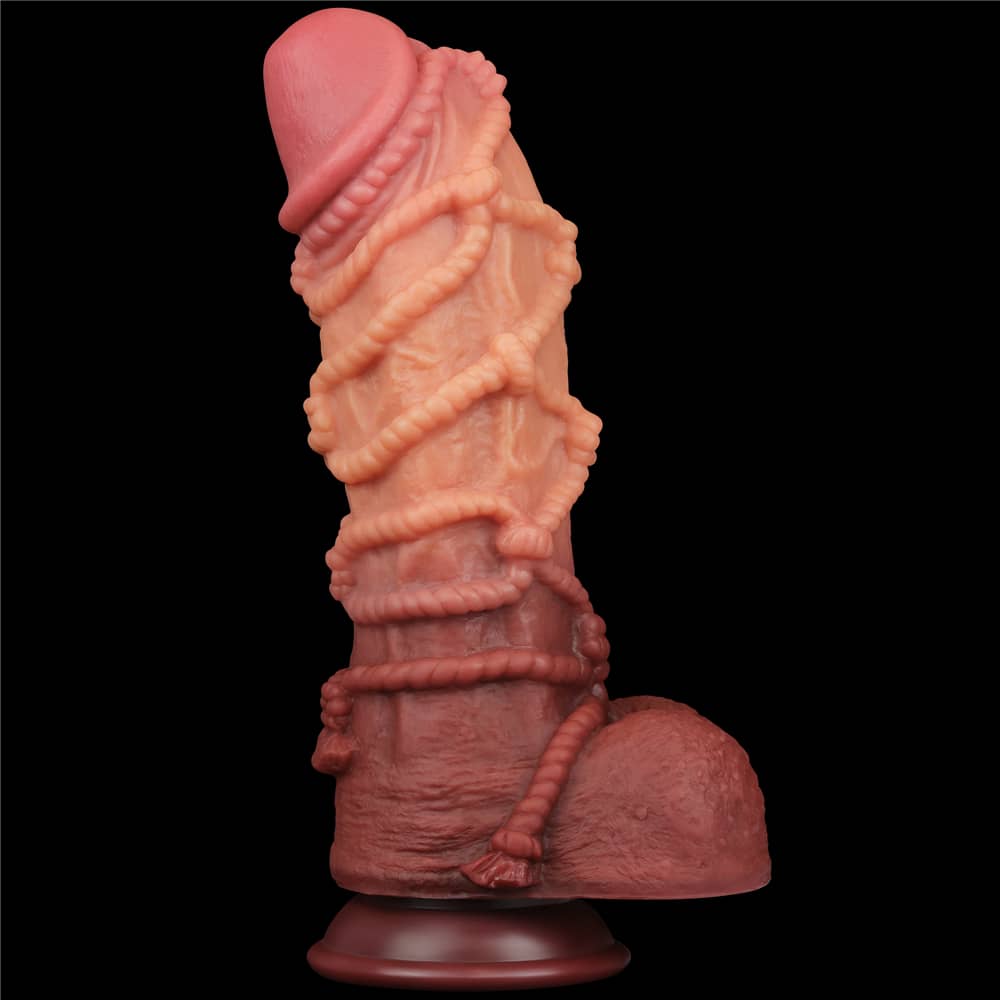 The 10.5 inches monster rope silicone dildo stands upright