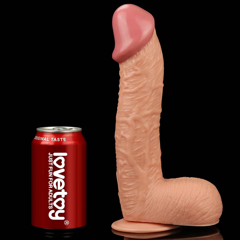 Comparison between the 10.5 inches legendary king sized realistic dildo and beverage cans 