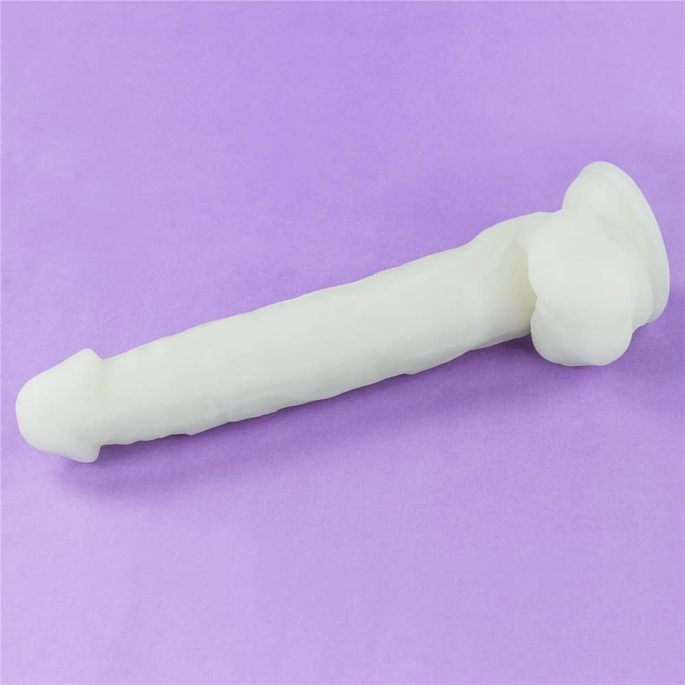 The 10.5 inches lumino play silicone dildo lays flat