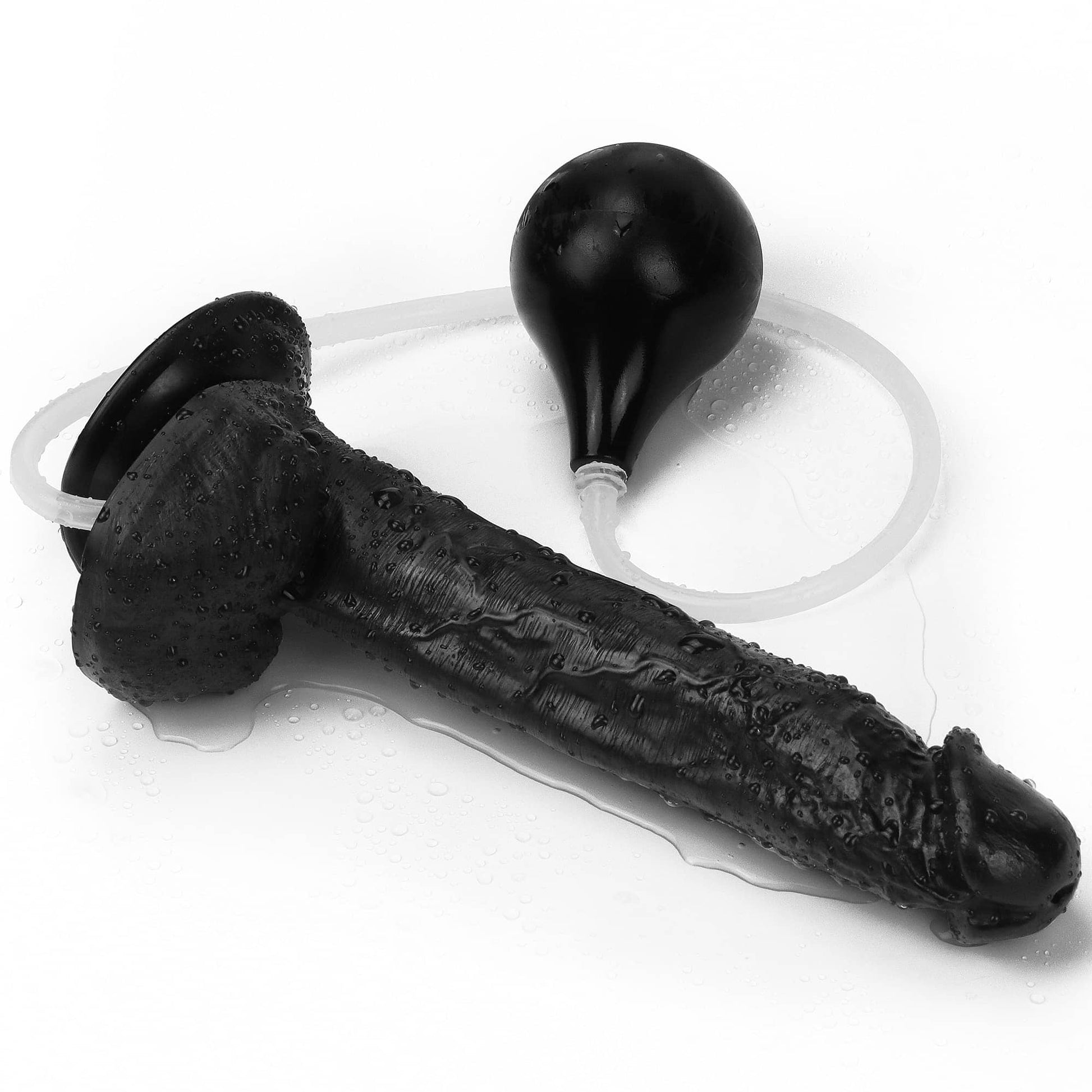 The 11 inches black realistic ejaculating dildo is shown lying flat
