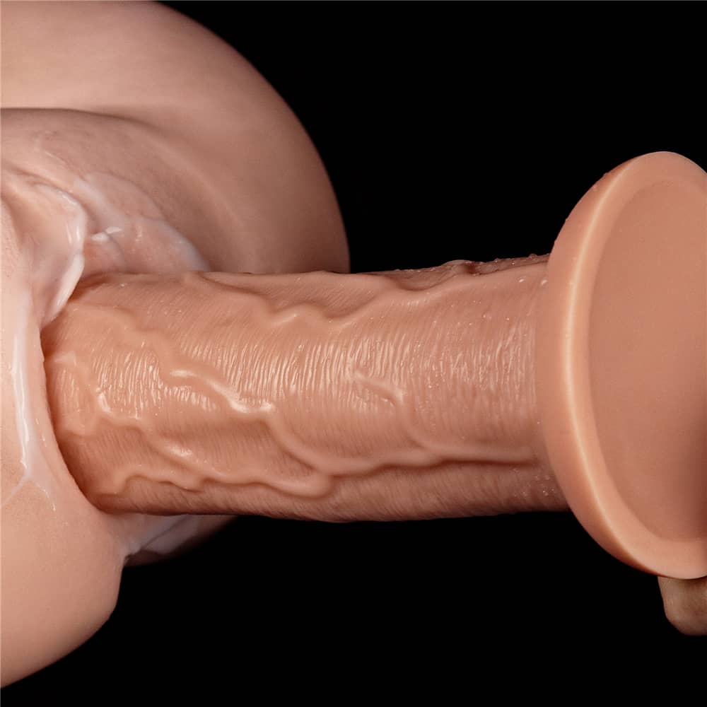 The 11 inches realistic long dildo is inserted into the masturbator
