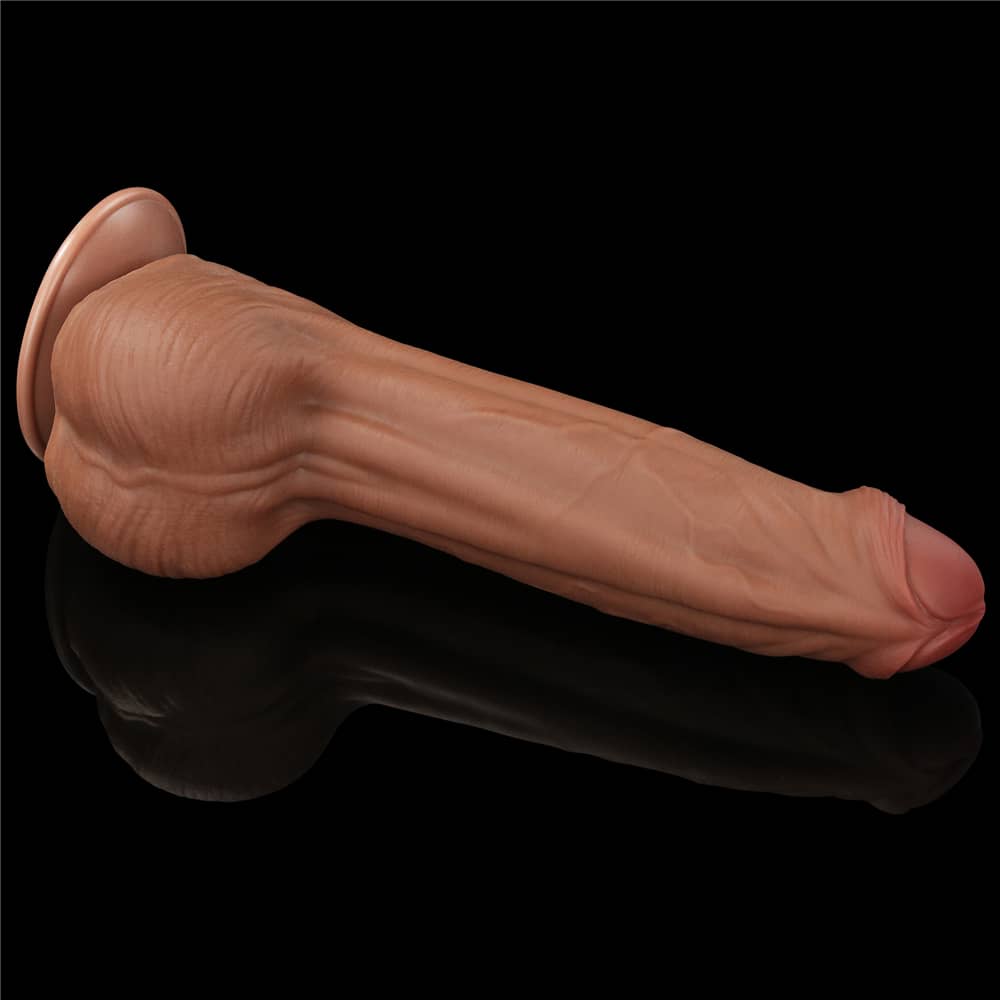 The 11.5 inches king sized sliding skin dildo shows its back and balls 