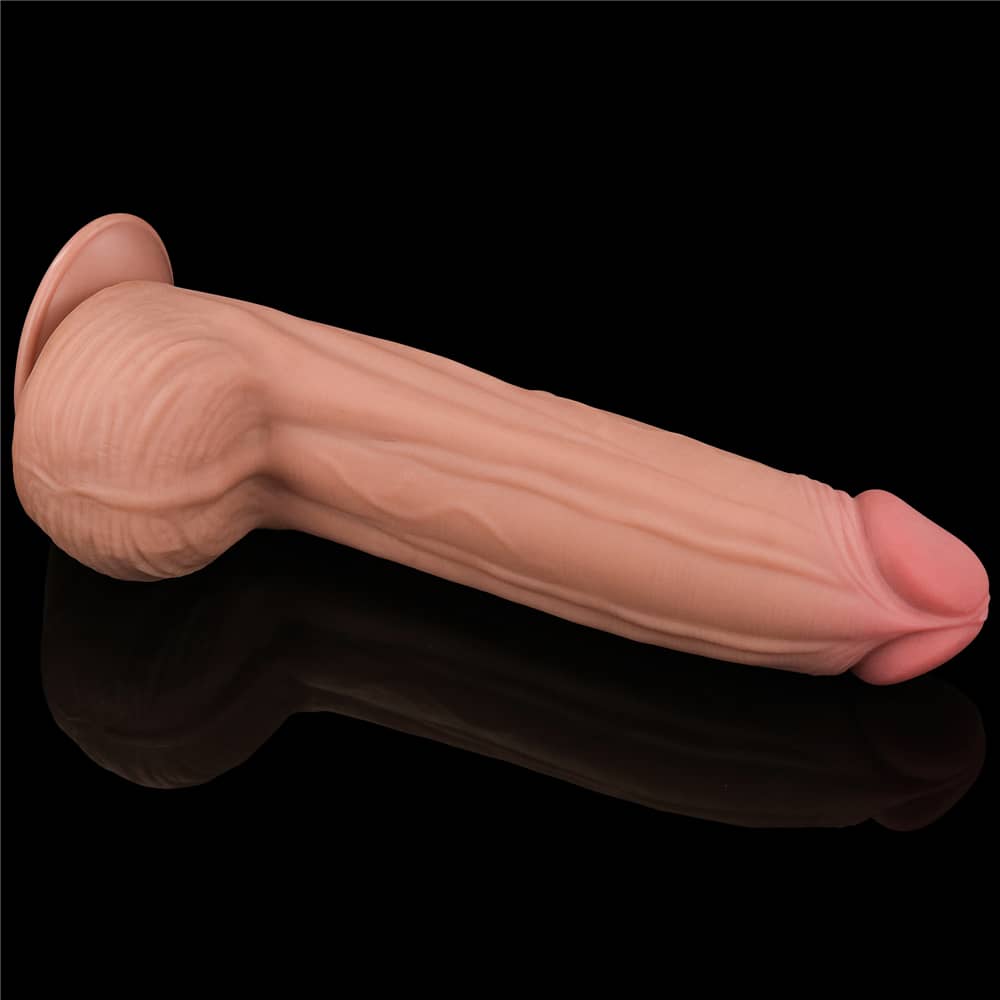 The 12 inches king sized sliding skin dual layer dong shows its back and balls 