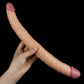 A man holds the 14 inches double ended realistic dildo to show its realistic body