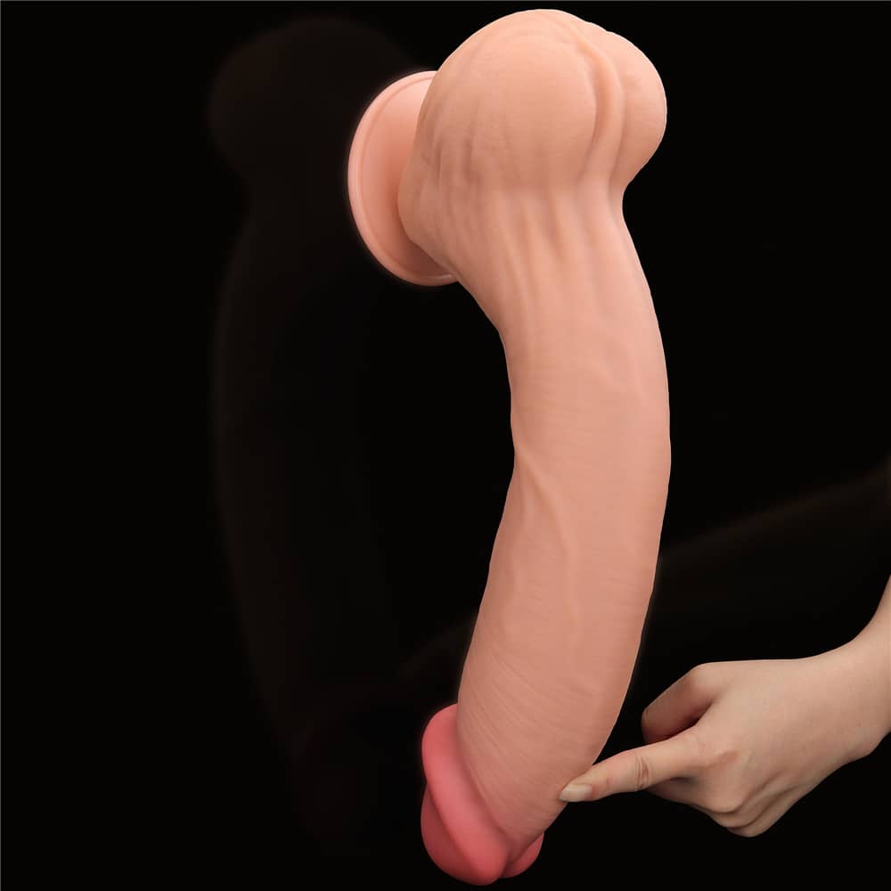 The 14 inches king sized sliding skin dildo bends softly downward