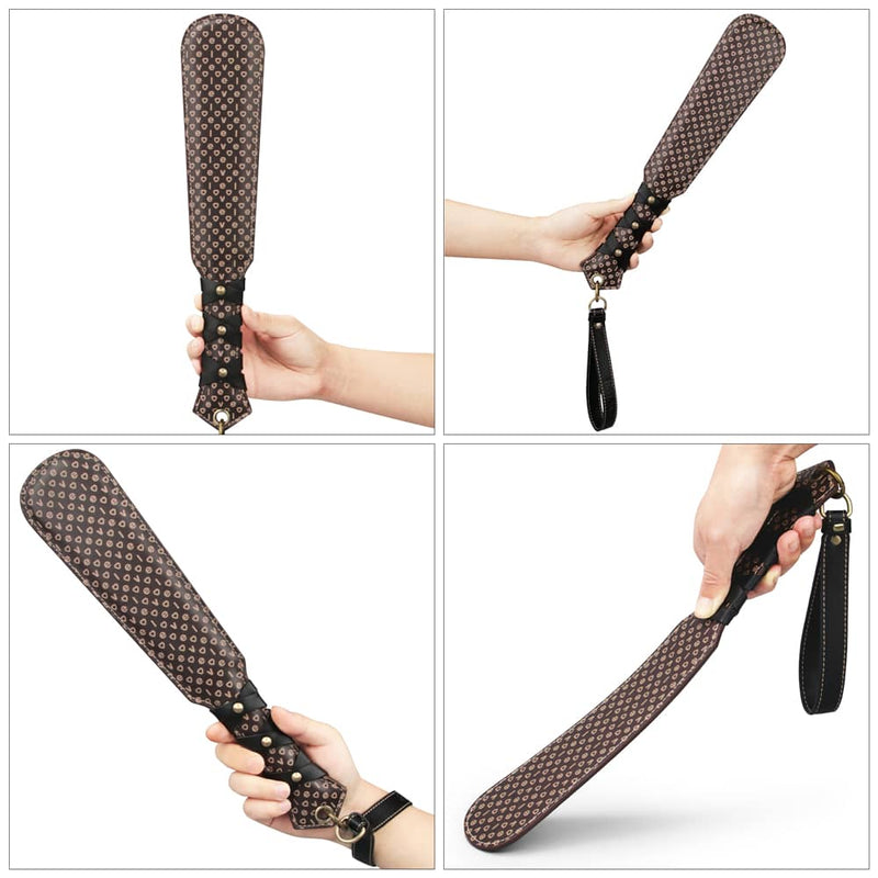 A man holds the 15 inches rebellion reign love paddle