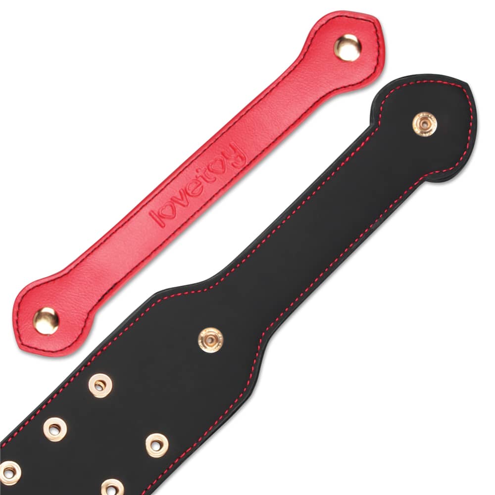 The detachable securing strap of the 15 inches rebellion reign dual branch paddle
