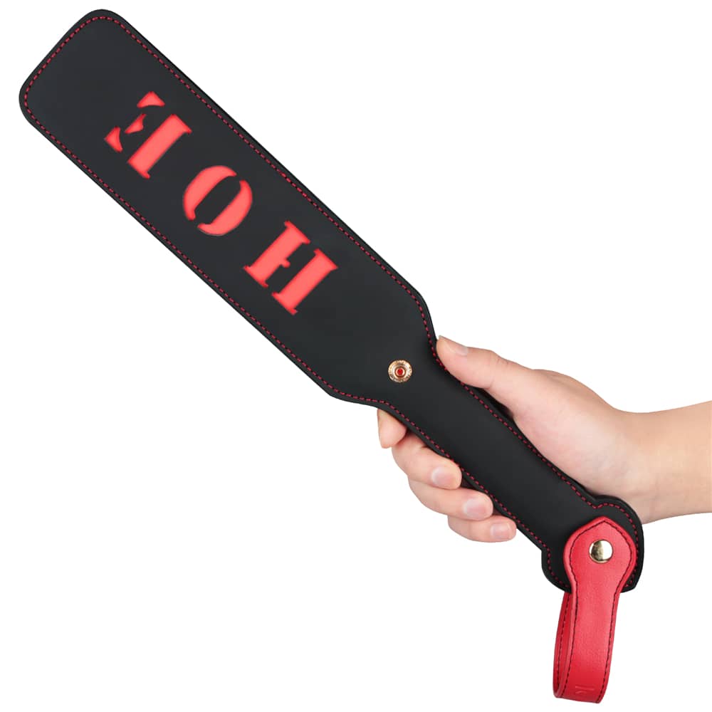 The 15 inches rebellion reign hoe paddle features the cut-out word HOE