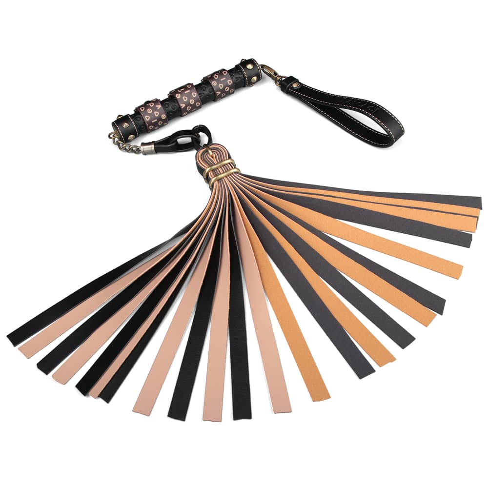 The rebellion reign flogger is crafted from sophisticated brown and black PU