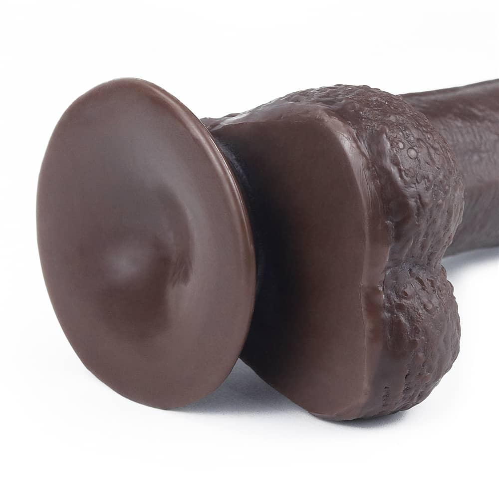 The strong suction cup of the 7 inches sliding skin dual layer black dildo