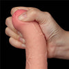 The bulging but soft head of the sliding skin realistic uncut dildo