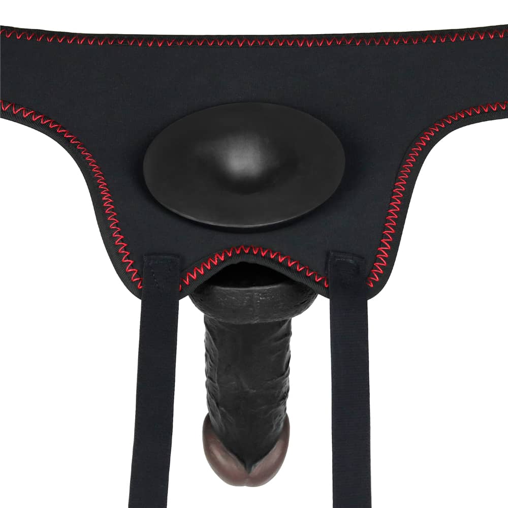 Put the dildo into the O ring of the black 7 inches vibrating dildo easy strapon set