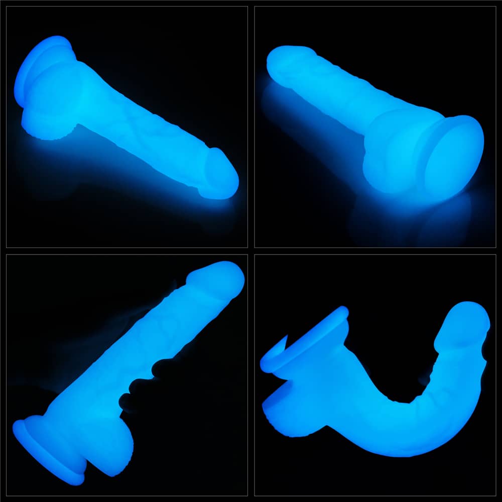 The different angles of the 7 inches lumino play silicone dildo that glows the blue light