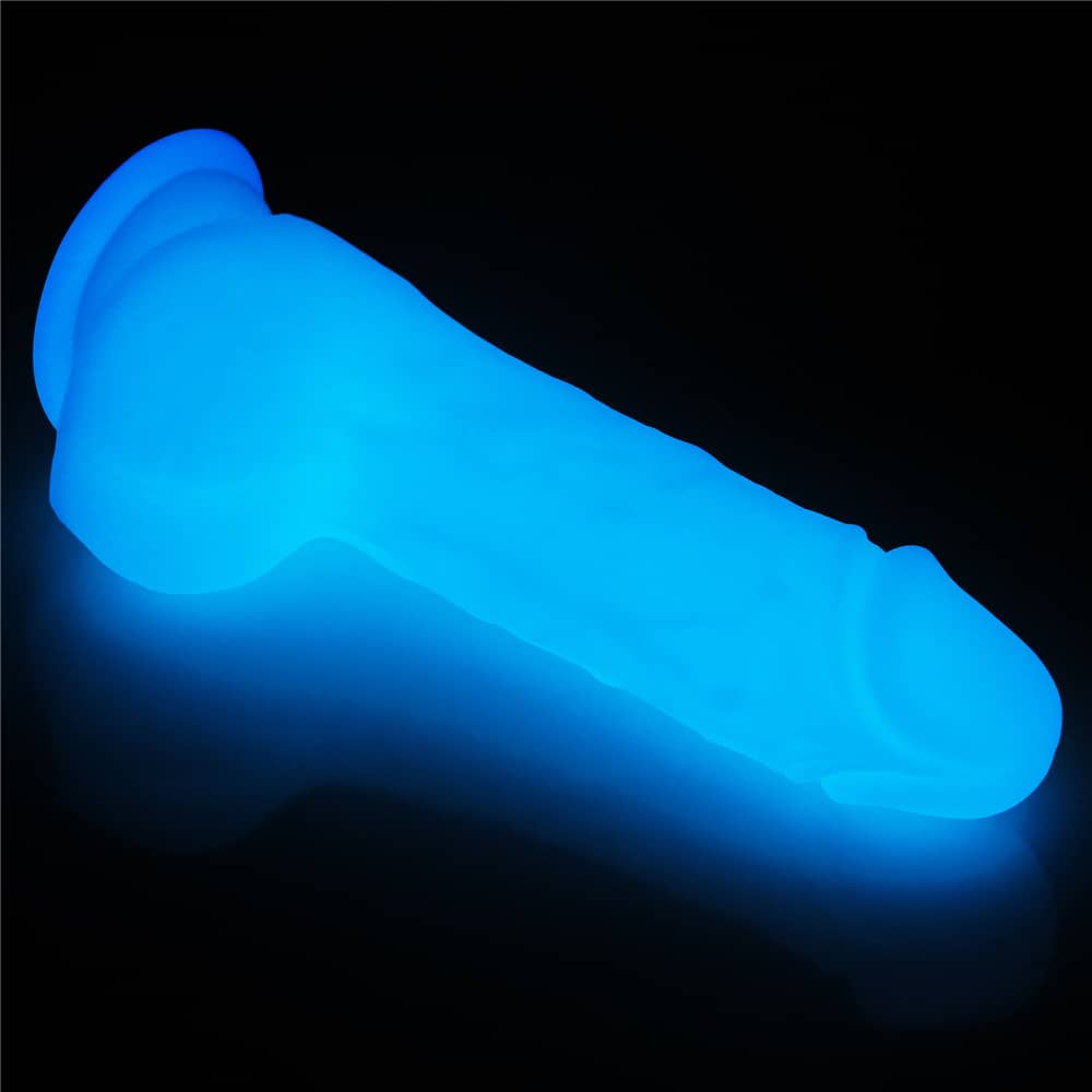 The 7.5 inches lumino play silicone dildo shows its back and balls 
