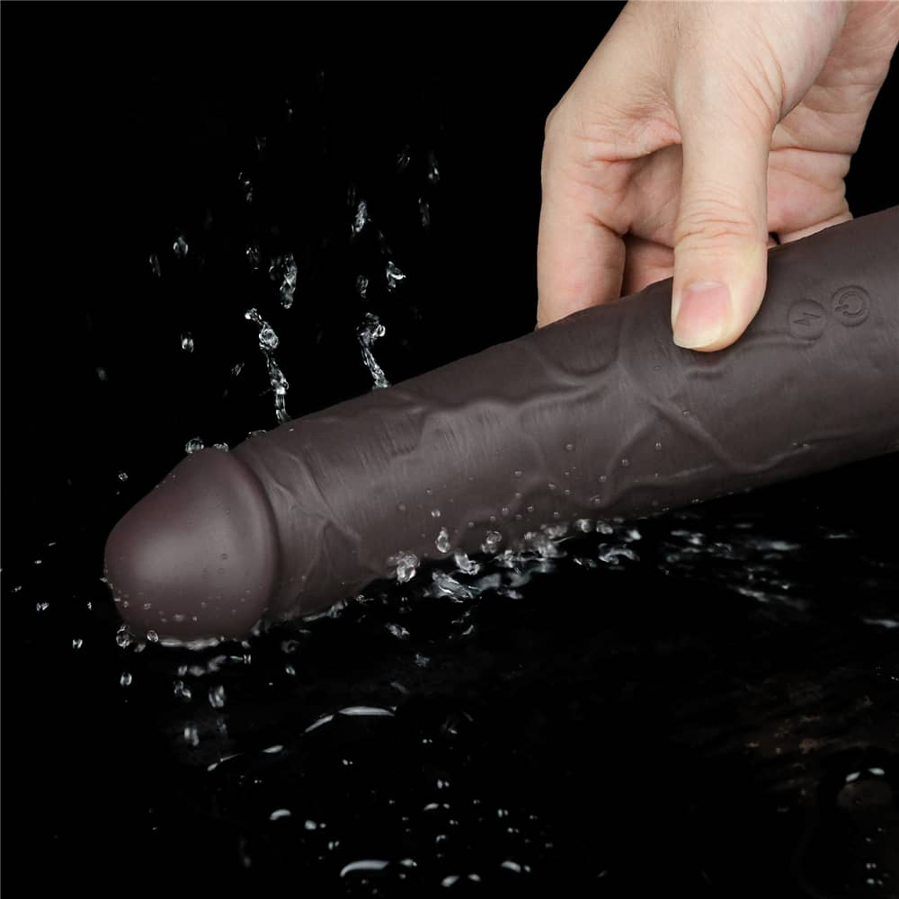 The 8 inches dual layered silicone rotator black is vibrating in the water