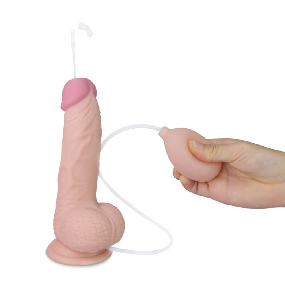 Squeeze the enema bulb to cause water to spurt out of the 8 inches soft ejaculation cock with ball