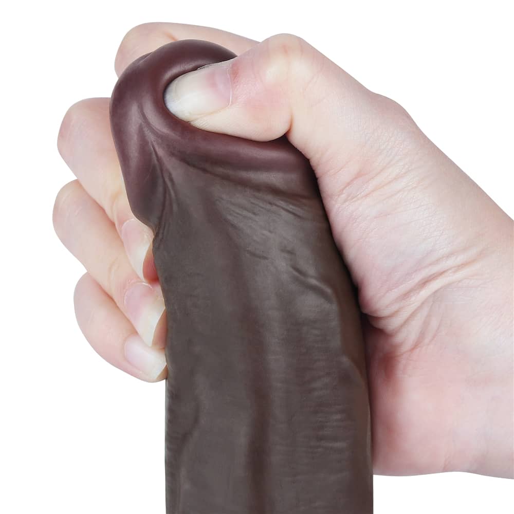 The bulging but soft head of the 8.5 inches sliding skin dual layer black dong 