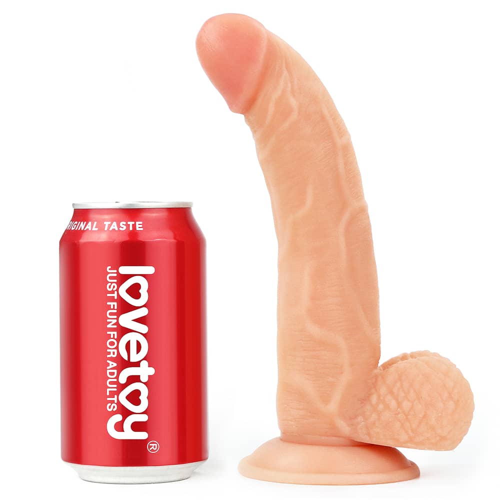 Comparison between the 8.5 inches strap on dildo and beverage cans