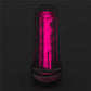 The 8.5 inches pink glow lumino play masturbator is is upright in the dark with pink fluorescence