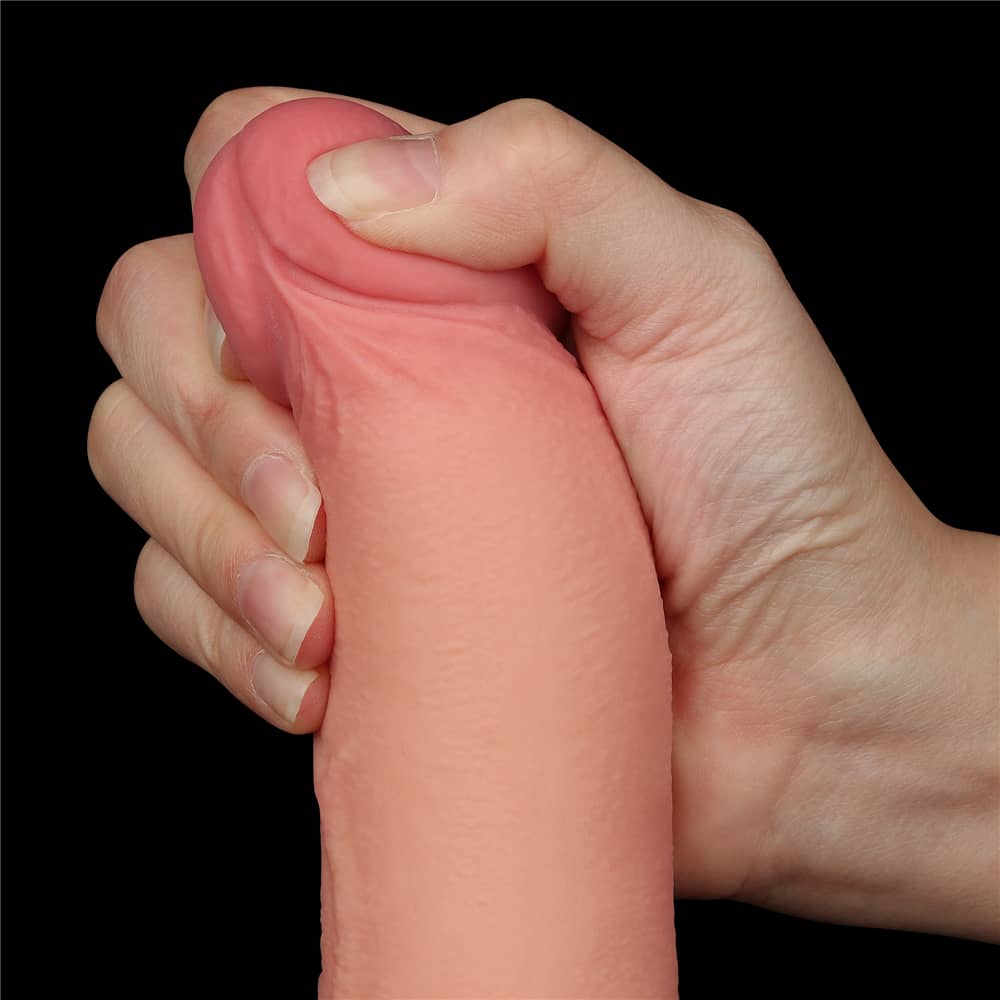 The bulging but soft head of the 8.5 inches flesh sliding skin dual layer dong 