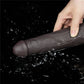 The 9 inches dual layered silicone rotator black is vibrating in the water