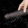 The 9 inches dual layered silicone rotator black is vibrating in the water