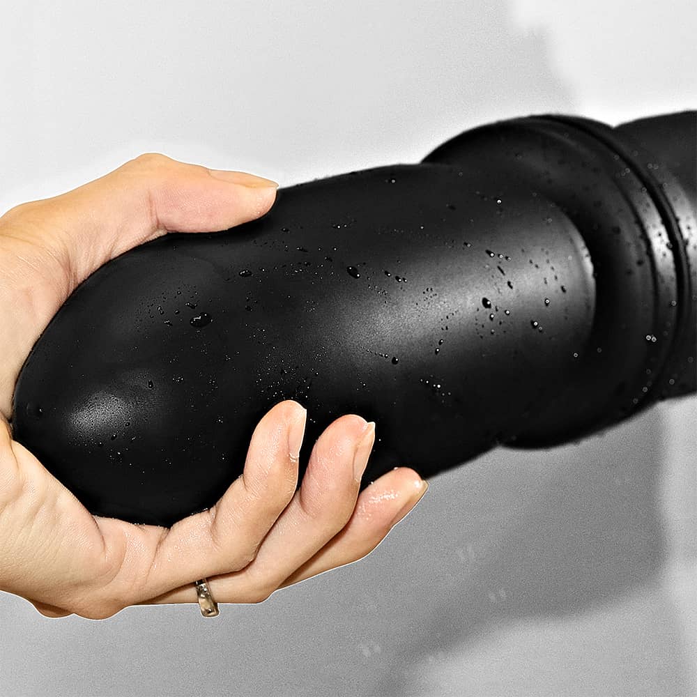 The 9" king size bomber butt plug can be easily attached to the mirror