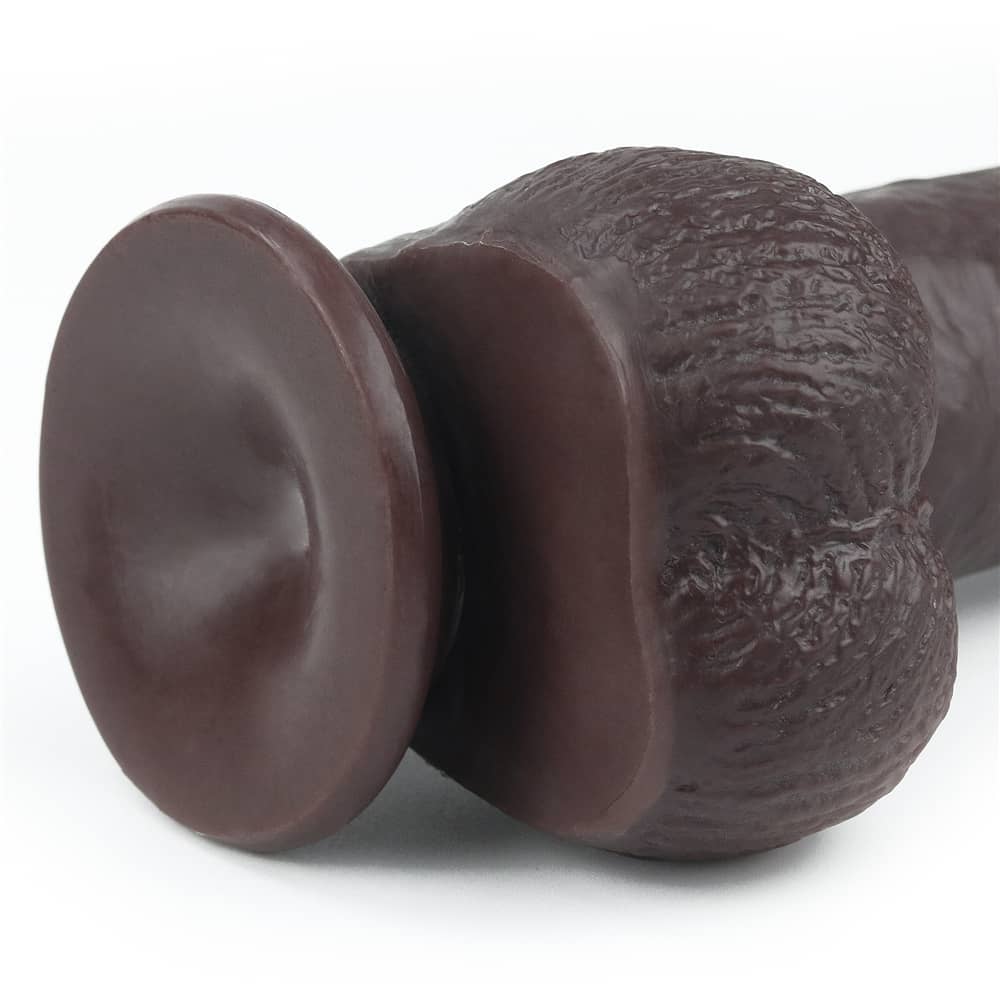 The 9 inches black sliding skin dual layer dong features a detachable powerful suction cup