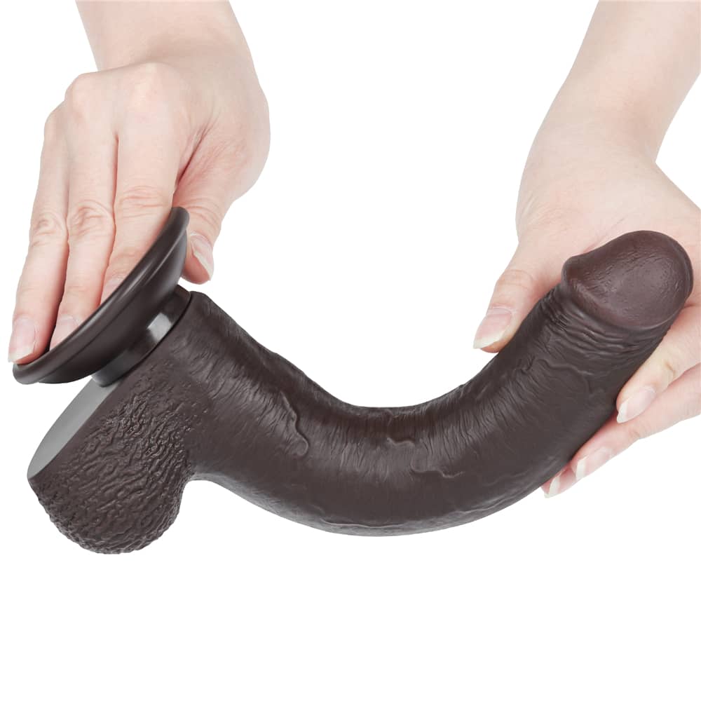 The 9 inches black sliding skin dual layer dong  is very flexible