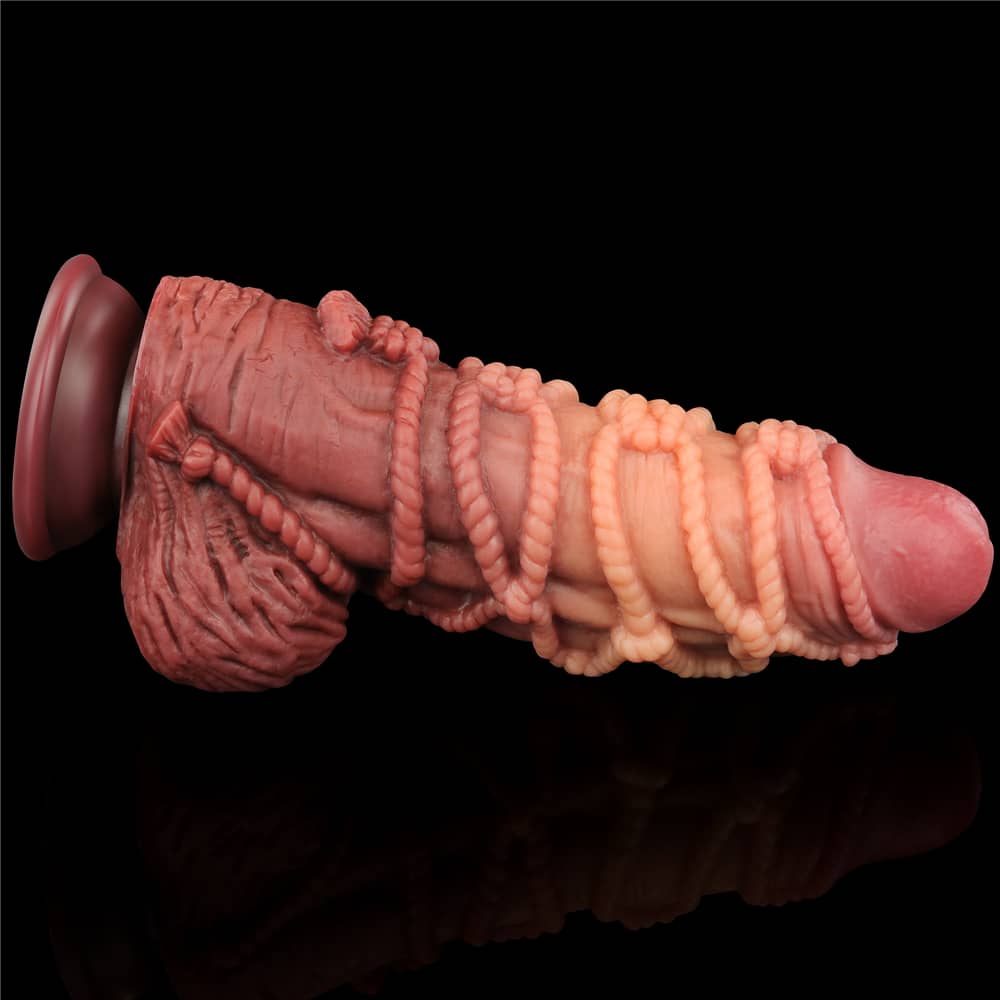 The cope on the surface of the The 9.5 inches dual layered silicone cock with rope