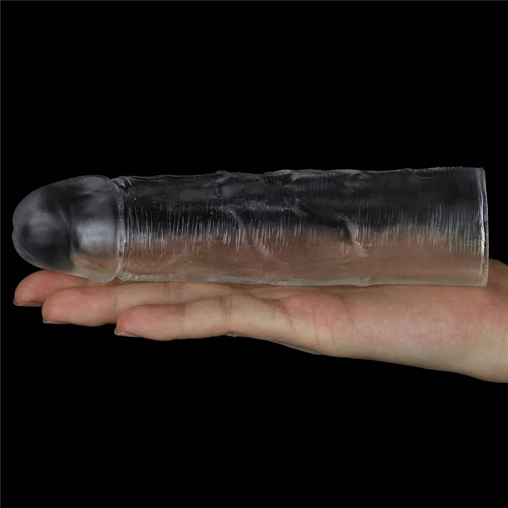 The add 1 inches flawless clear penis sleeve lays flat on the palm