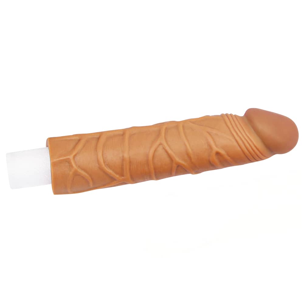 The add 1 inches pleasure x tender brown penis sleeve provides an additional 1 inches in length