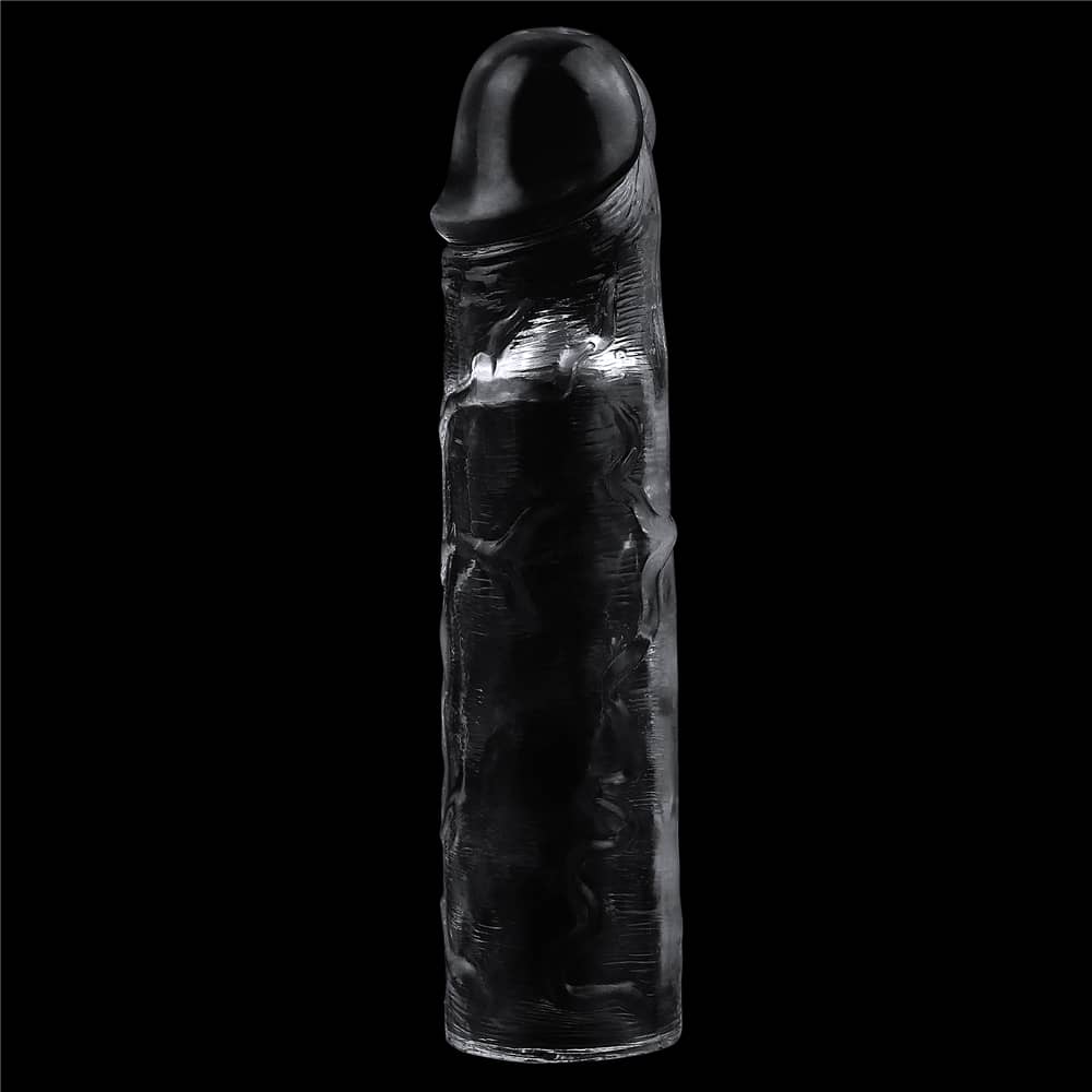 The add 2 inches flawless clear penis sleeve stands upright