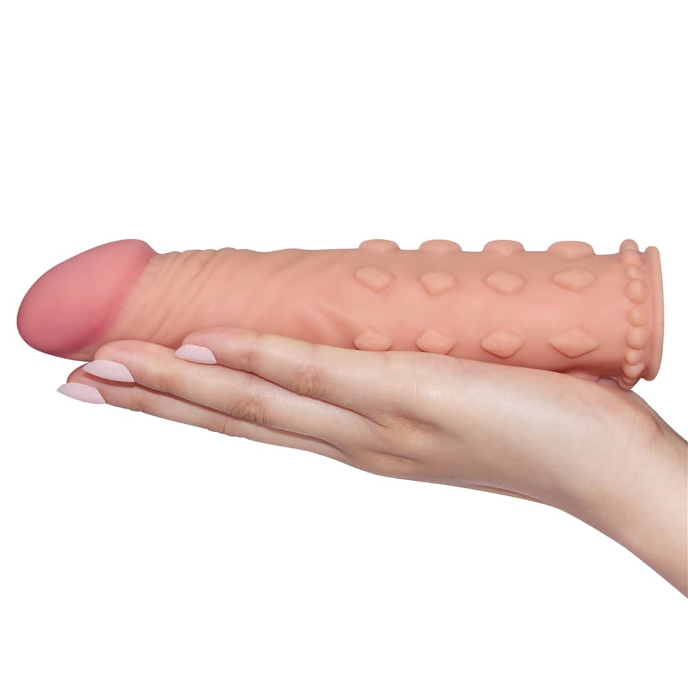 The add 2 inches pleasure x tender flesh penis sleeve lays flat