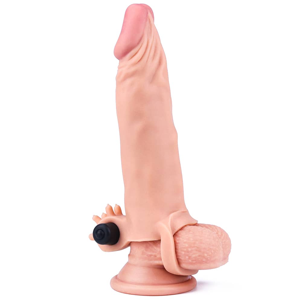 The flesh add 2 inches vibrating penis sleeve worn on dildo