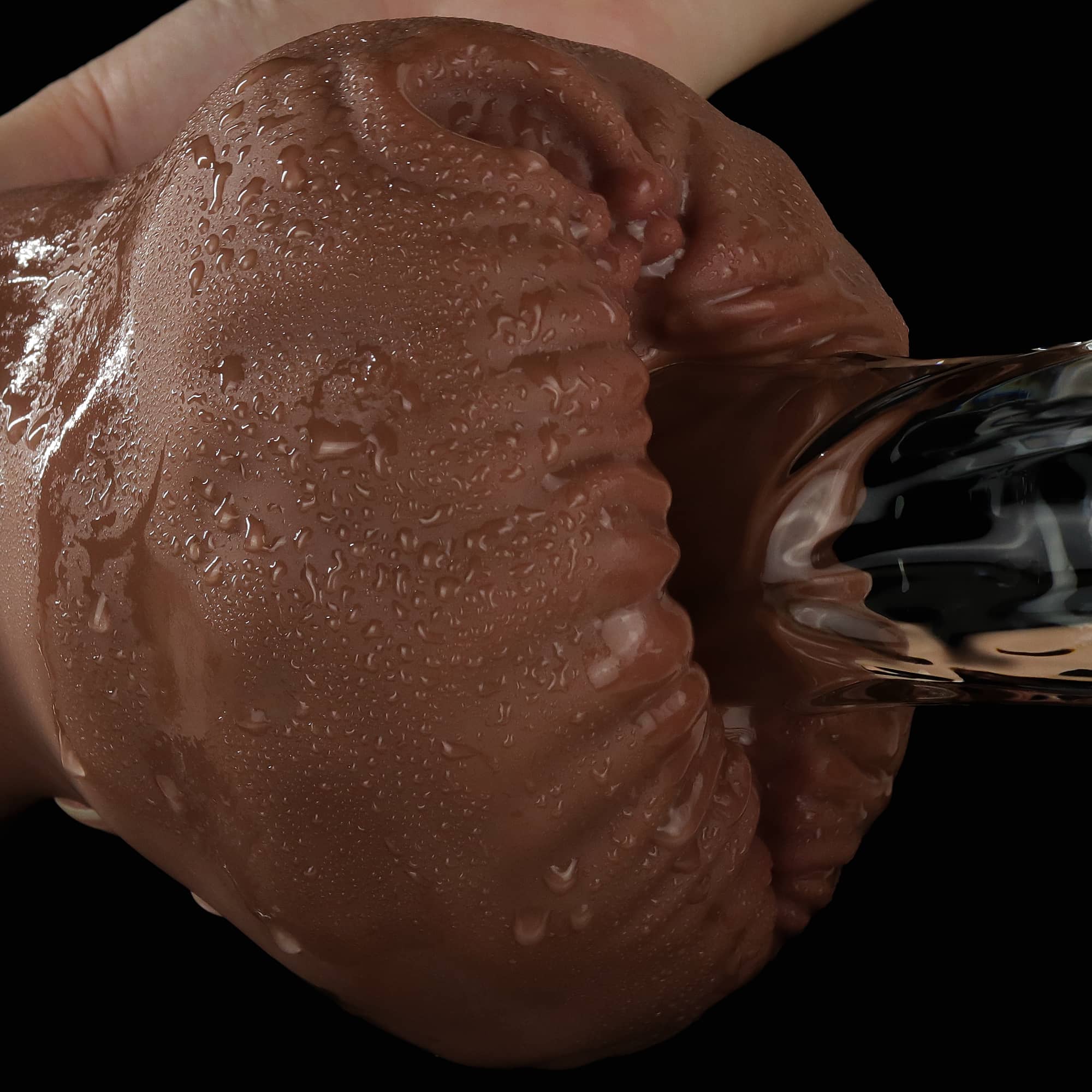 A dildo inserted into the aliens pie male masturbator