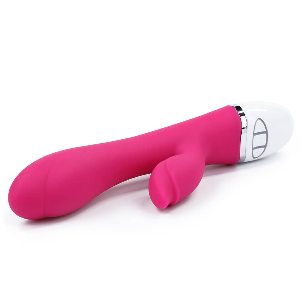 The two heads of the pink rechargeable vibrator