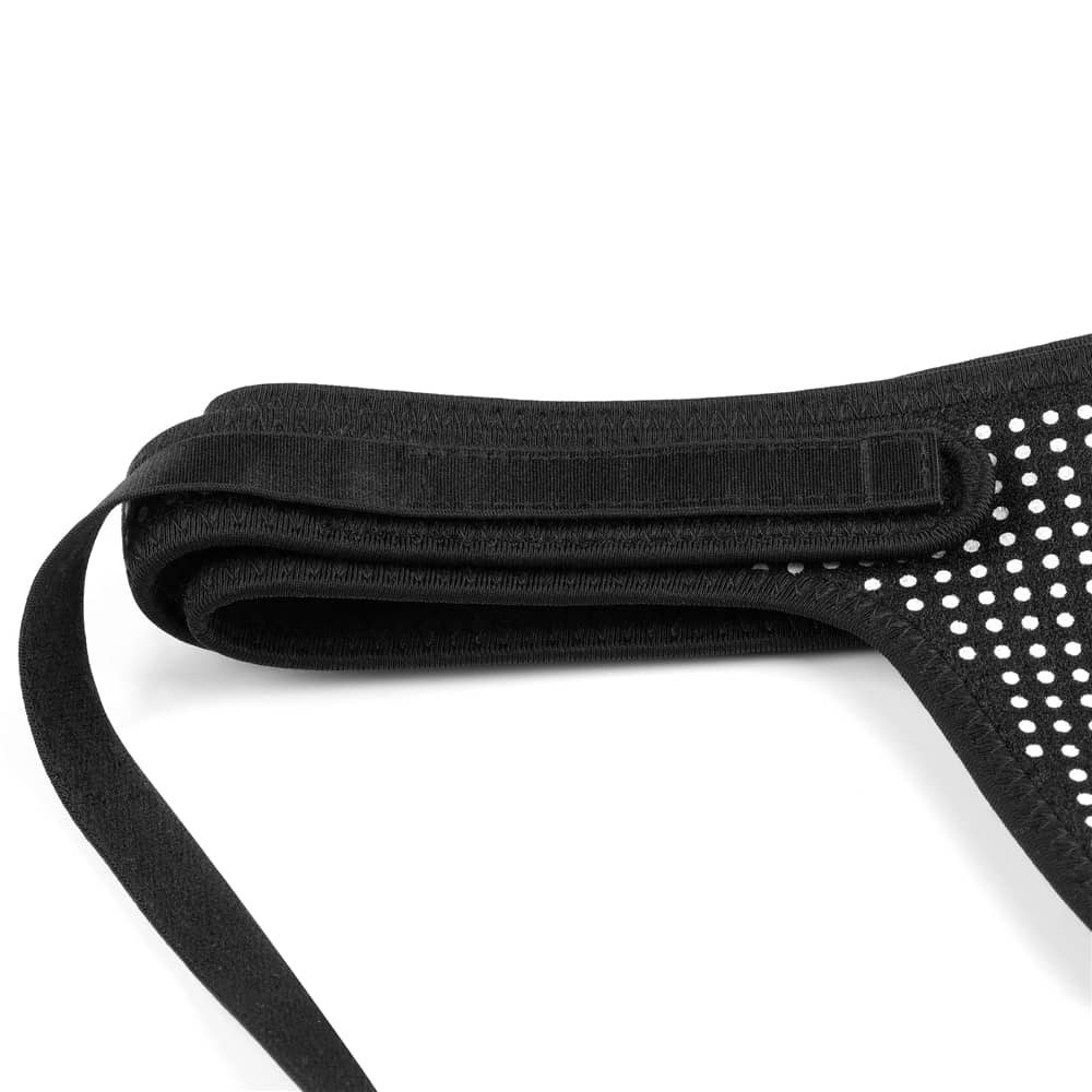 The elastic webbing of the polka dots easy strap on harness