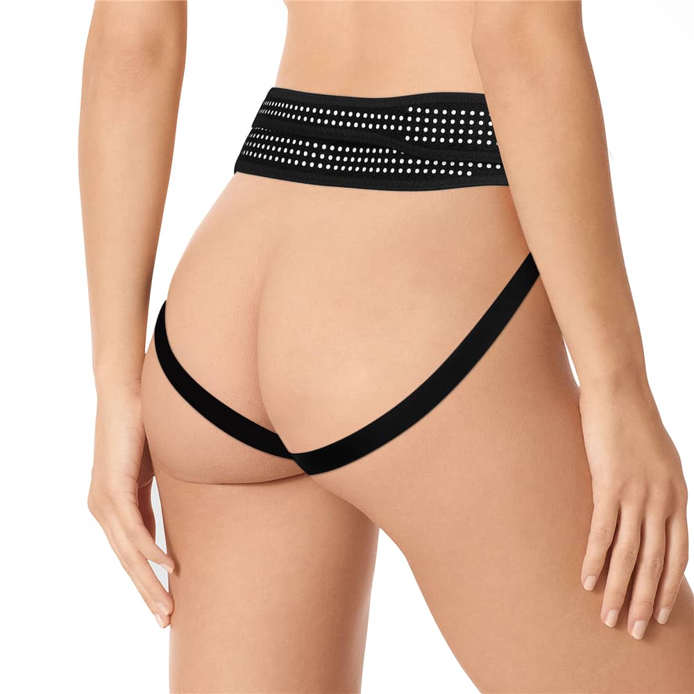 The back of a woman wearing the polka dots easy strap on harness