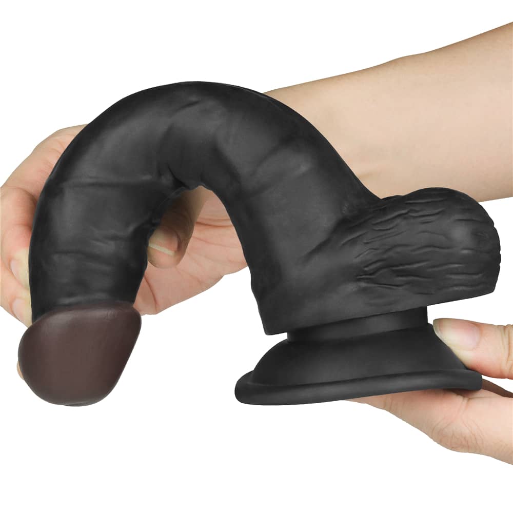 The dildo of the 7.5 inches black dildo easy strapon set  bends ultra softly