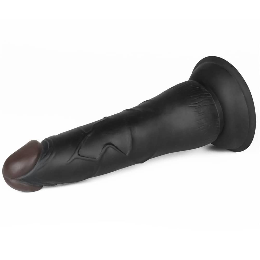 The dildo of the 7.5 inches black dildo easy strapon set lays flat