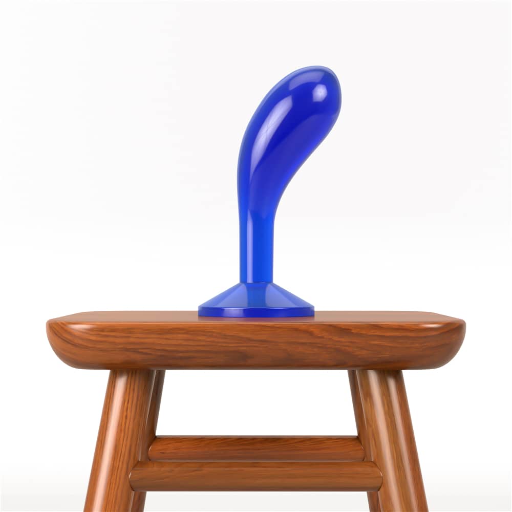 The 6 inches blue flawless clear prostate butt plug  is put on a chair