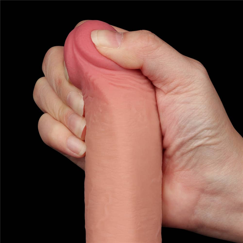 The bulging but soft head of the 9 inches sliding skin dual layer flesh dong 
