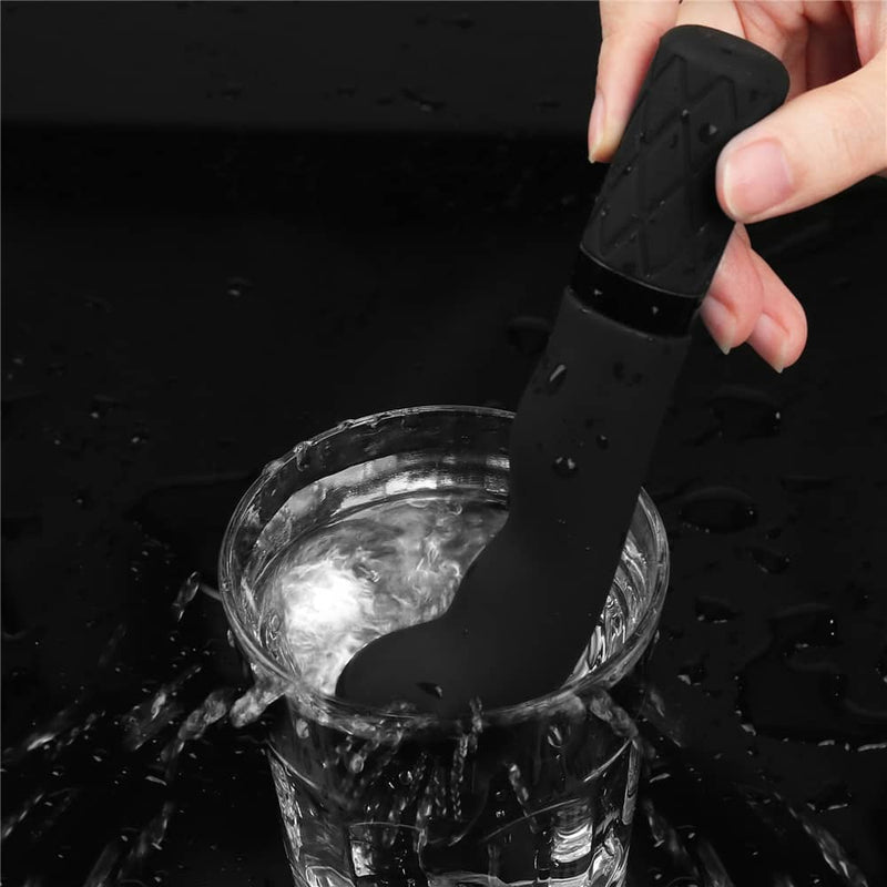 The g spot finger vibrator is vibrating in the water
